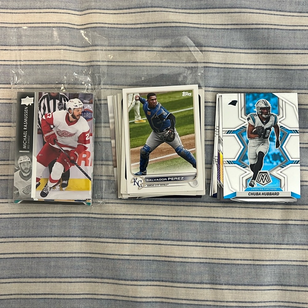 Assorted sports collector cards: 22 baseball; 23 football; 25 hockey; 1 lacrosse